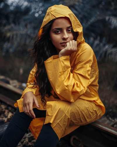 Girn in yellow raincoat