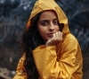 Girl in yellow raincoat